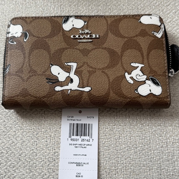 Coach Handbags - NWT Coach X Snoopy Peanuts Medium Id Zip Wallet In Signature Canvas